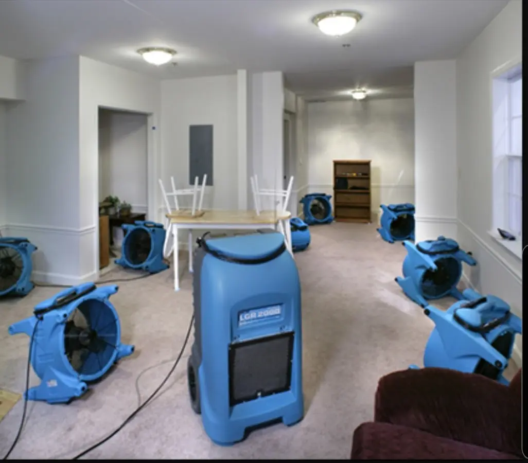 Air movers and dehumidifier setup for Water Damage Restoration in Visalia